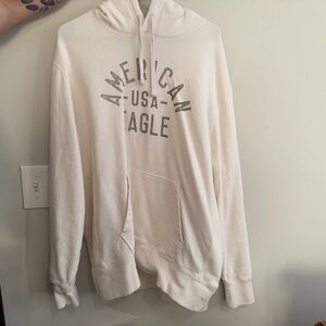 American Eagle Outfitters Cream Hoodie with Gray Logo